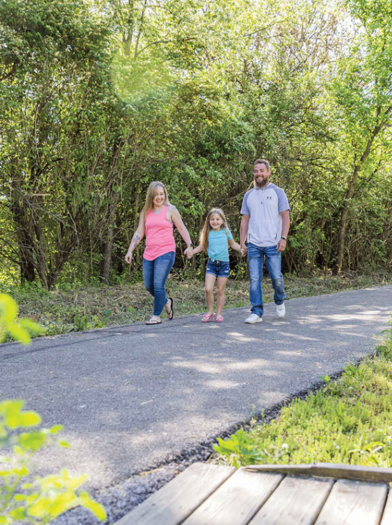 Family walking at Paint Creek Recreation Trails